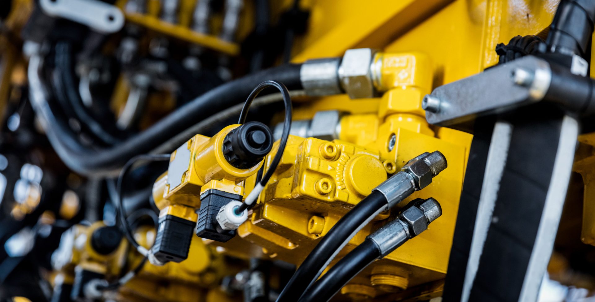Close up of yellow engineering machinery